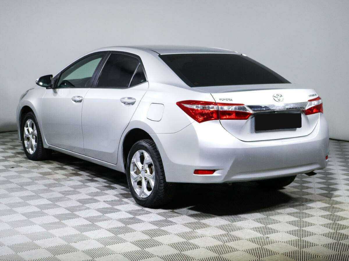 Toyota Corolla 2013 года с пробегом. Фото: #4