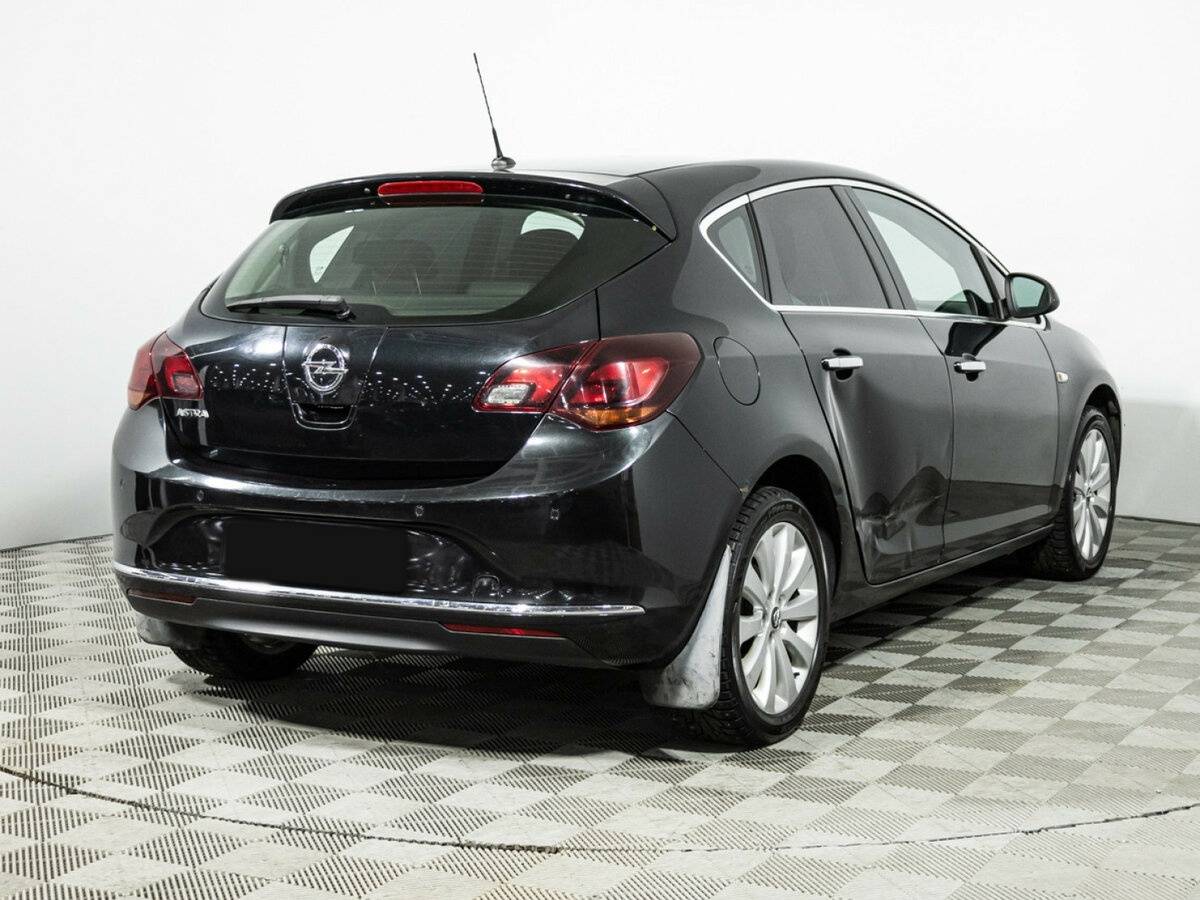 Opel Astra 2013 года с пробегом. Фото: #10