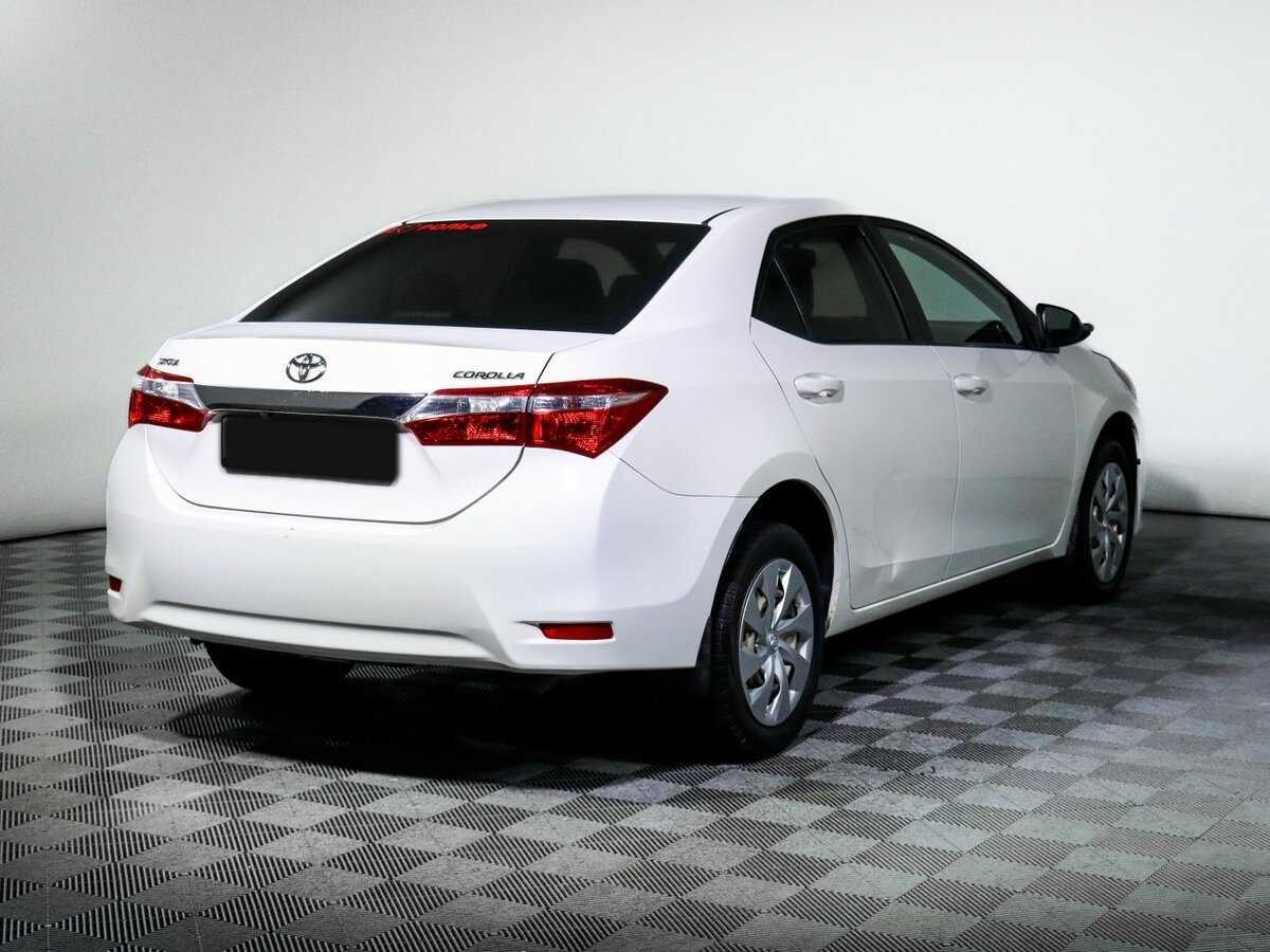 Toyota Corolla 2014 года с пробегом. Фото: #4