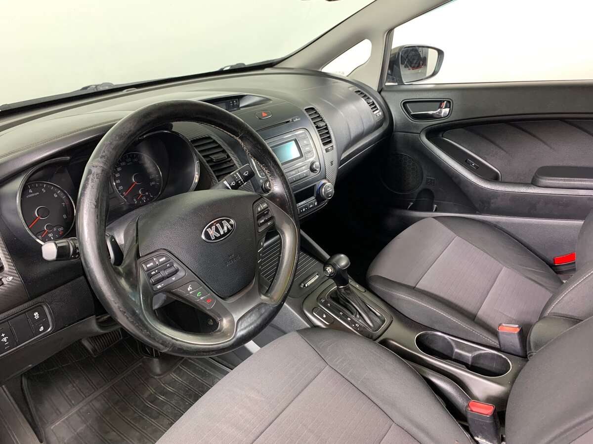 Kia Cerato 2013 года с пробегом. Фото: #10