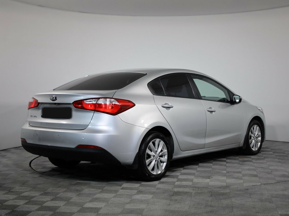 Kia Cerato 2013 года с пробегом. Фото: #4