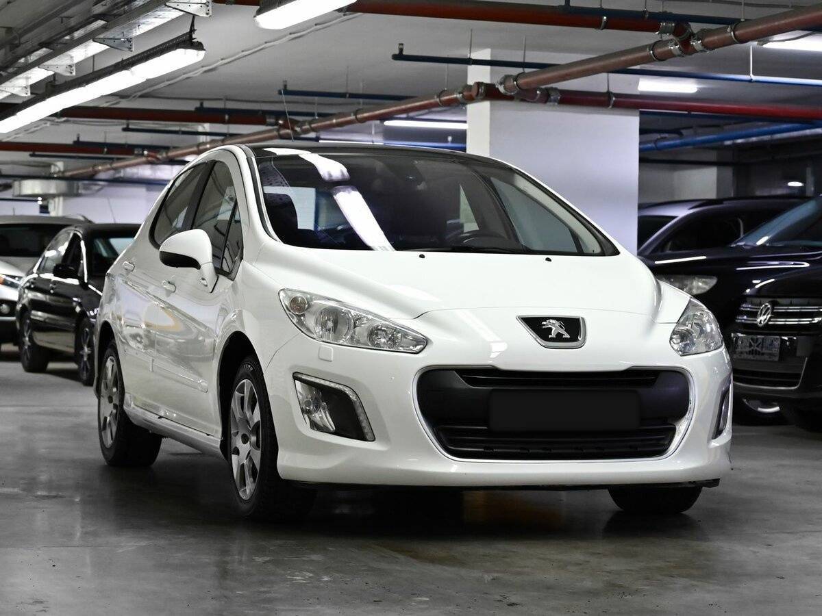 Peugeot 308 2012 года с пробегом. Фото: #1