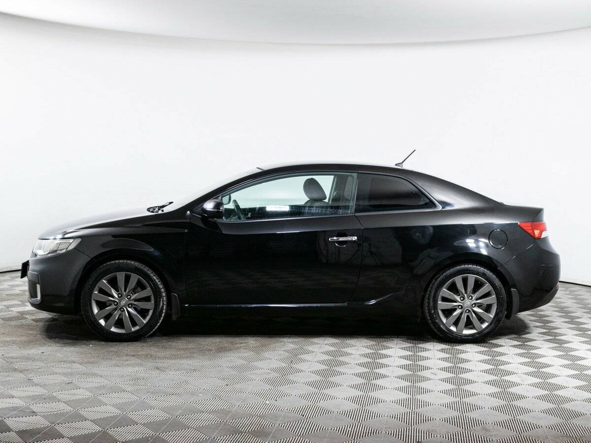 Kia Cerato 2012 года с пробегом. Фото: #7