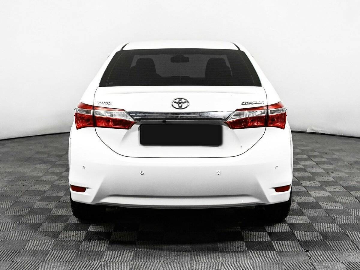 Toyota Corolla 2013 года с пробегом. Фото: #5