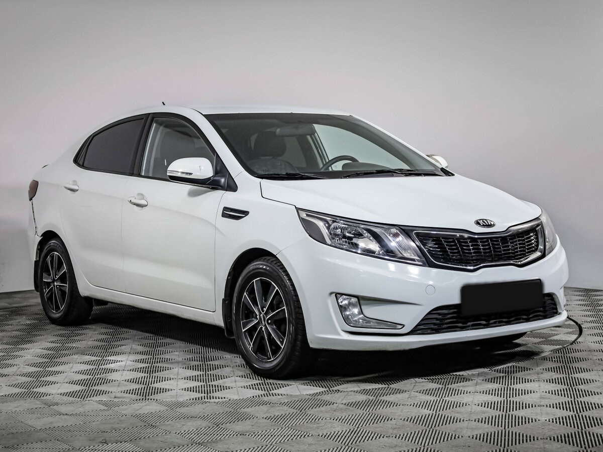 Kia Rio 2013 года с пробегом. Фото: #2