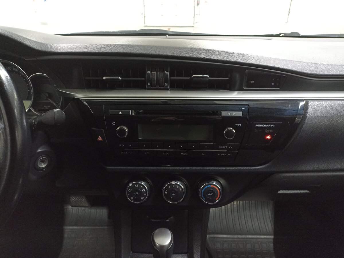 Toyota Corolla 2013 года с пробегом. Фото: #14