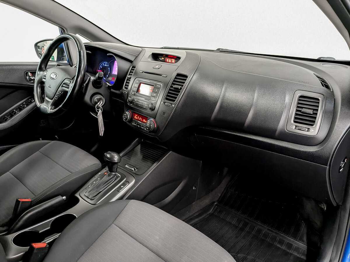 Kia Cerato 2013 года с пробегом. Фото: #10