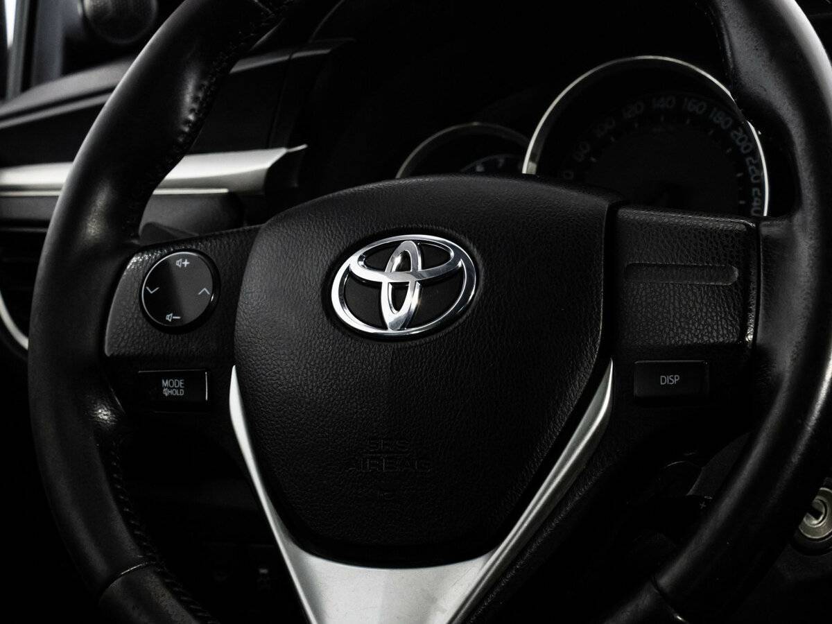 Toyota Corolla 2013 года с пробегом. Фото: #10