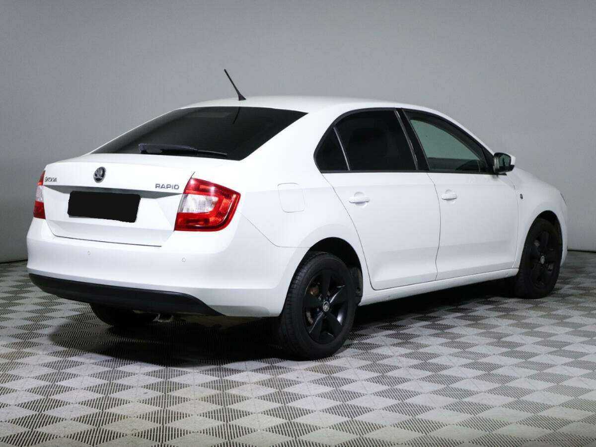 Skoda Rapid 2014 года с пробегом. Фото: #4
