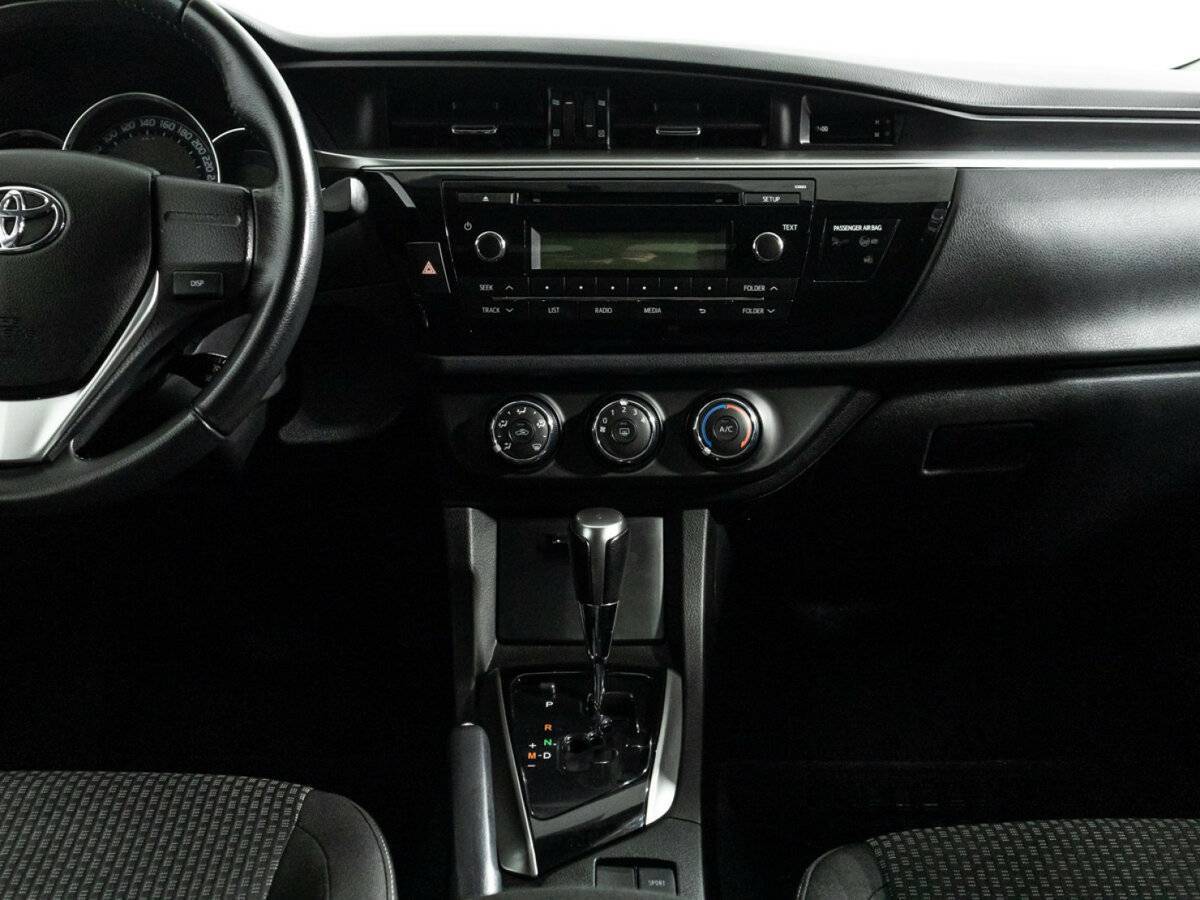 Toyota Corolla 2013 года с пробегом. Фото: #13
