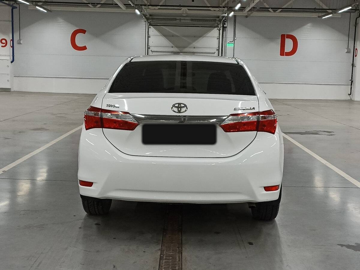 Toyota Corolla 2013 года с пробегом. Фото: #5
