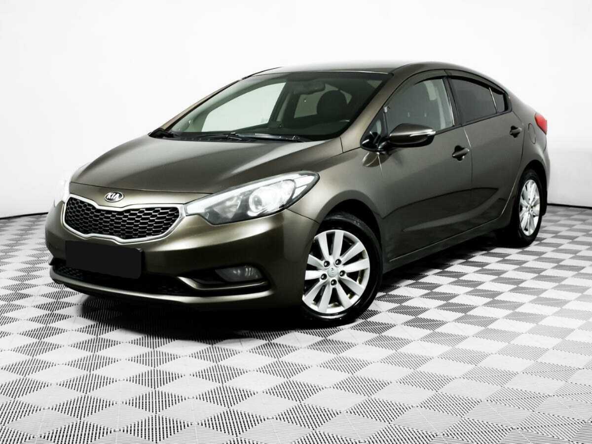 Kia Cerato 2014 года с пробегом. Посмотреть фото