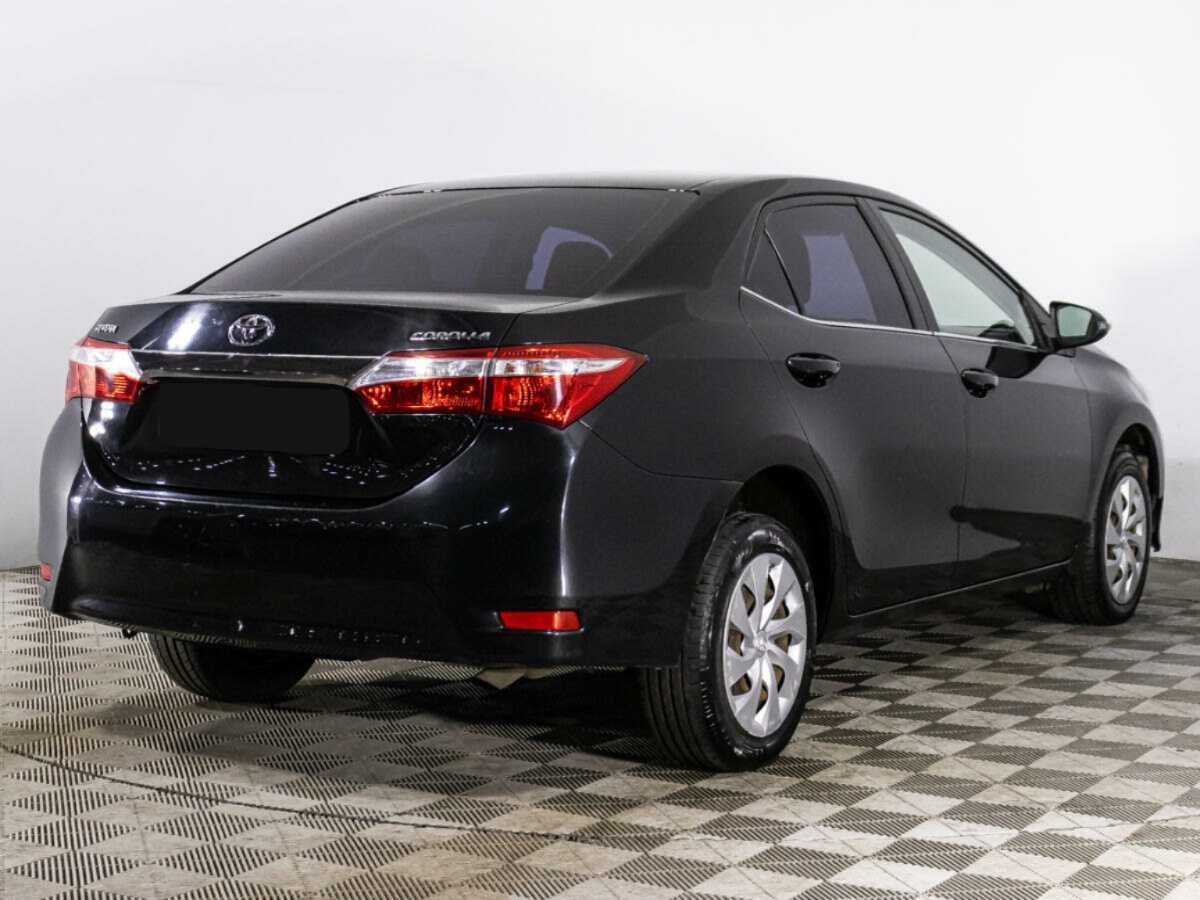 Toyota Corolla 2013 года с пробегом. Фото: #4