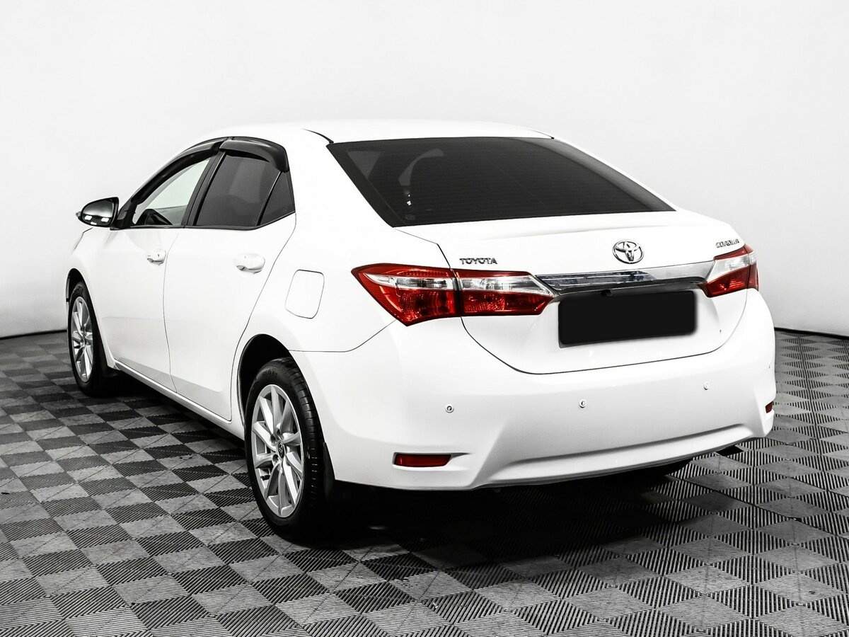 Toyota Corolla 2013 года с пробегом. Фото: #6
