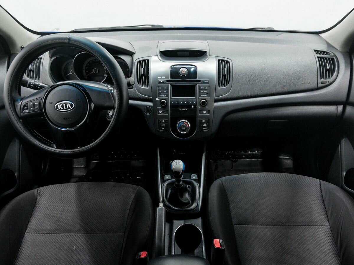 Kia Cerato 2012 года с пробегом. Фото: #9