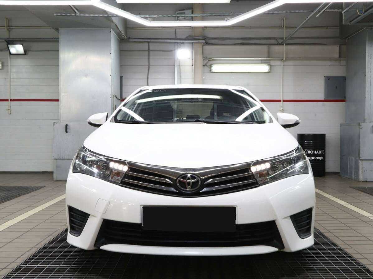 Toyota Corolla 2014 года с пробегом. Фото: #2