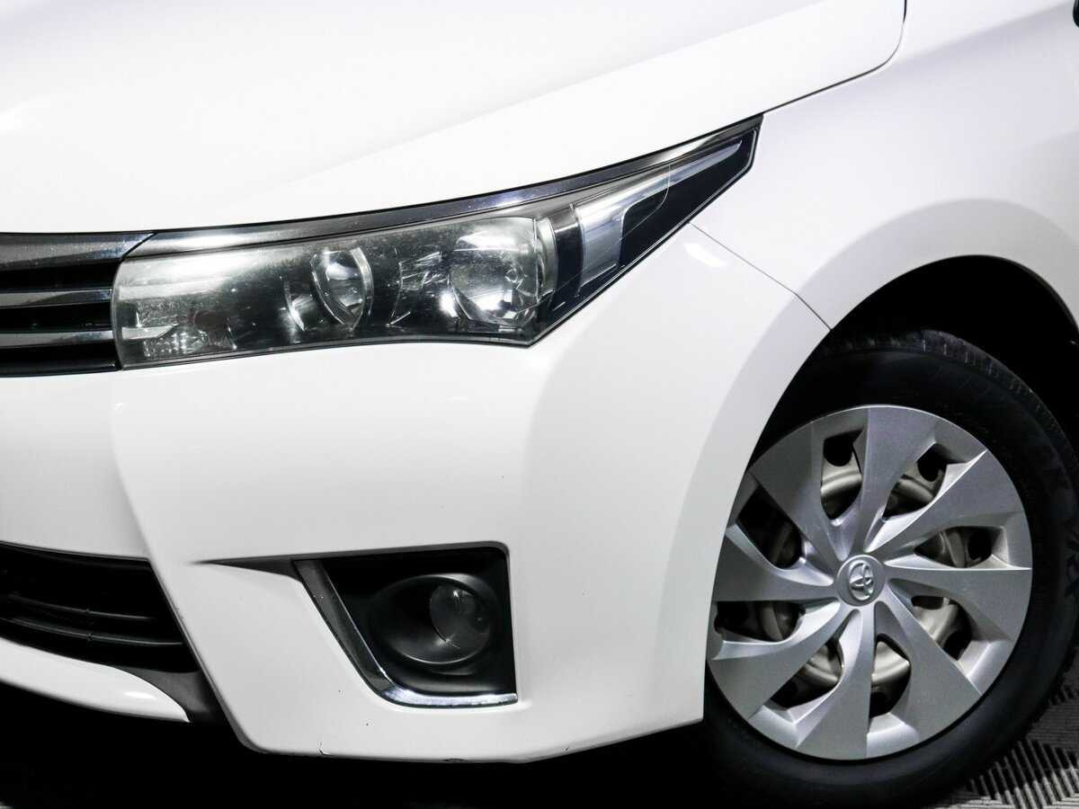 Toyota Corolla 2014 года с пробегом. Фото: #15