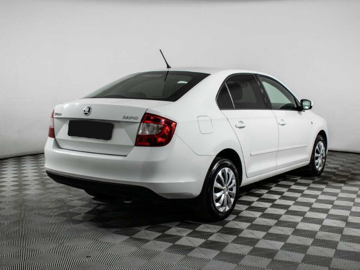 Skoda Rapid 2014 года с пробегом. Фото: #3