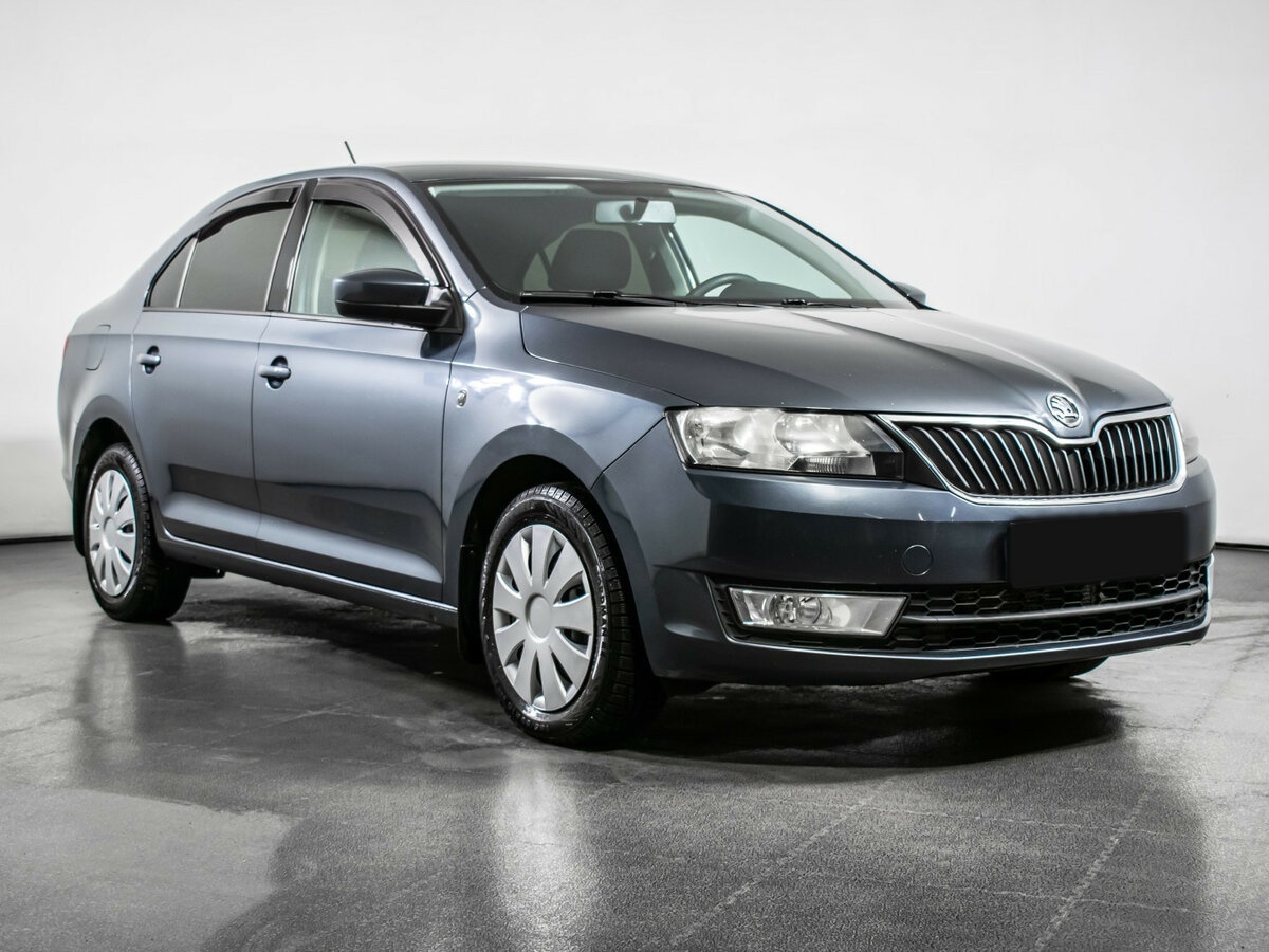 Skoda Rapid 2014 года с пробегом. Фото: #2