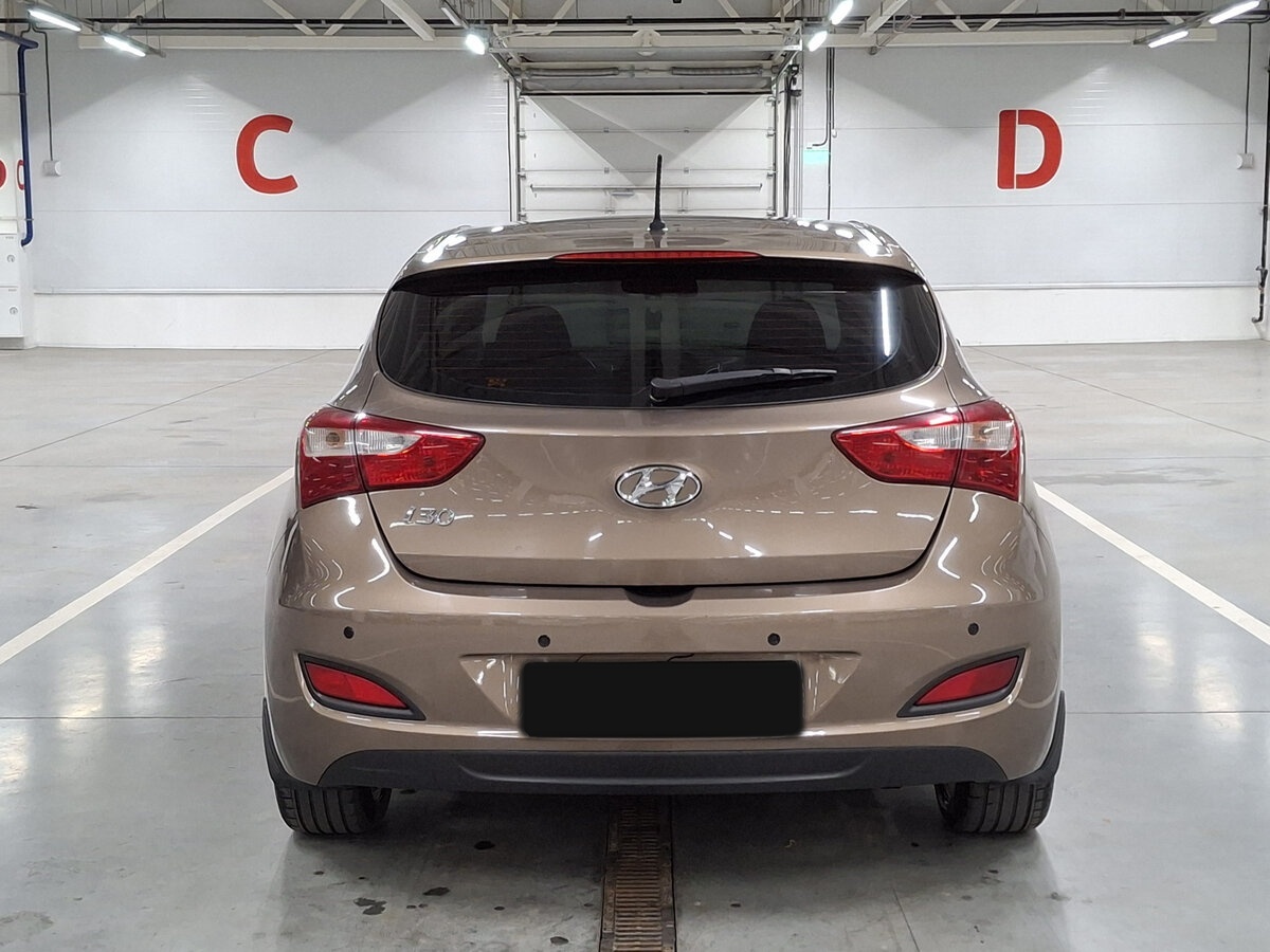 Hyundai i30 2013 года с пробегом. Фото: #5