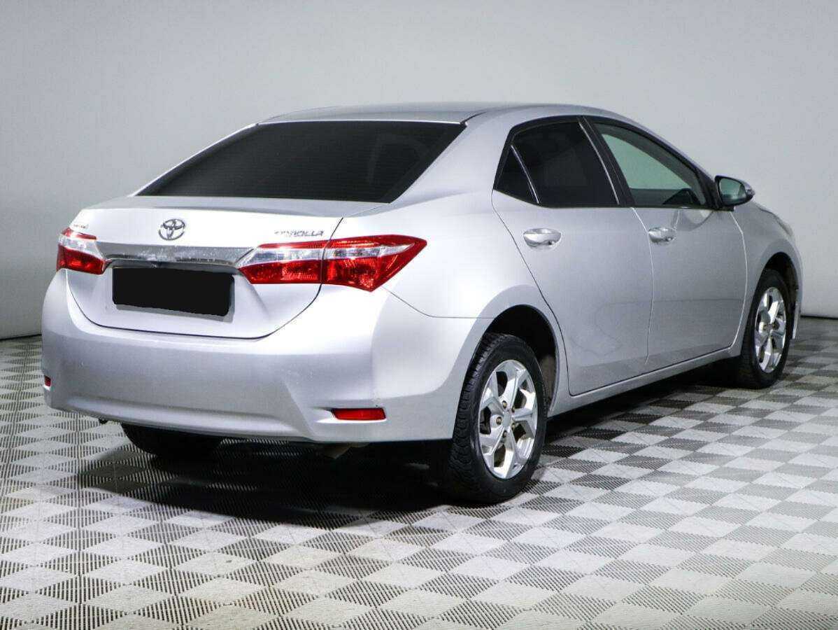 Toyota Corolla 2013 года с пробегом. Фото: #2