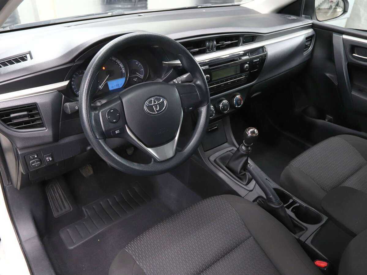 Toyota Corolla 2014 года с пробегом. Фото: #6