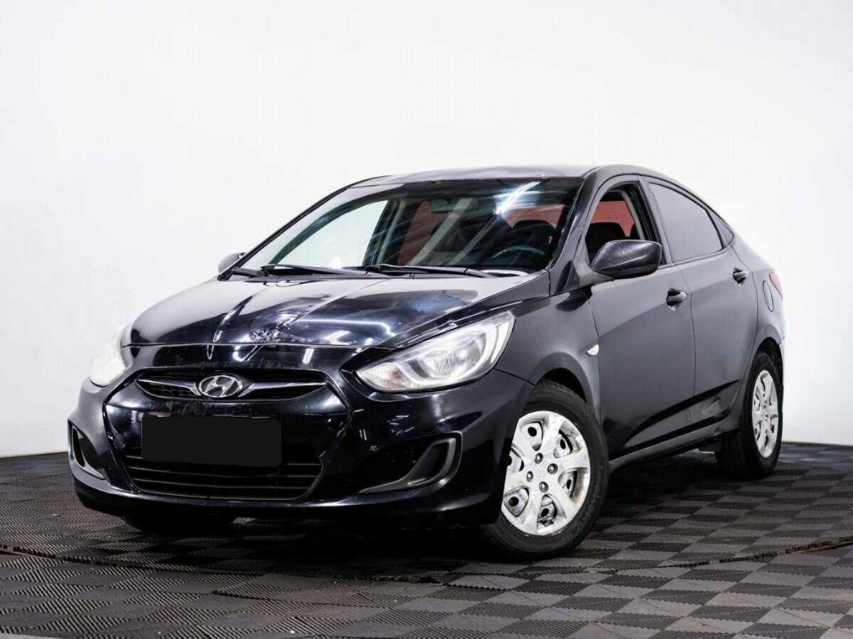 Hyundai Solaris 2013 года с пробегом. Посмотреть фото
