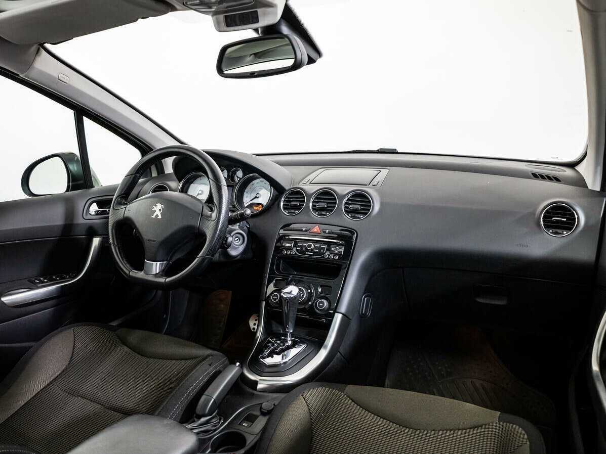 Peugeot 308 2013 года с пробегом. Фото: #8
