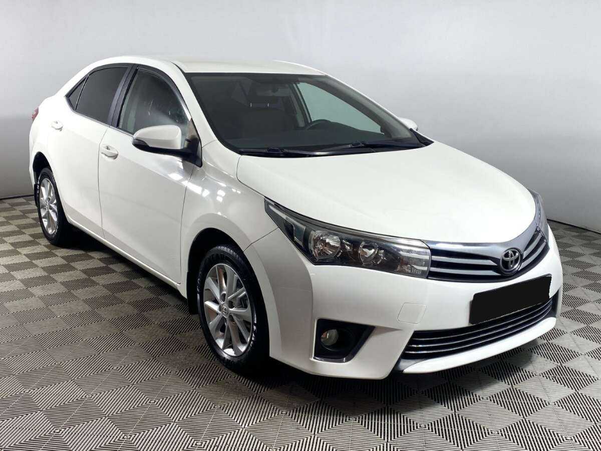 Toyota Corolla 2013 года с пробегом. Фото: #2