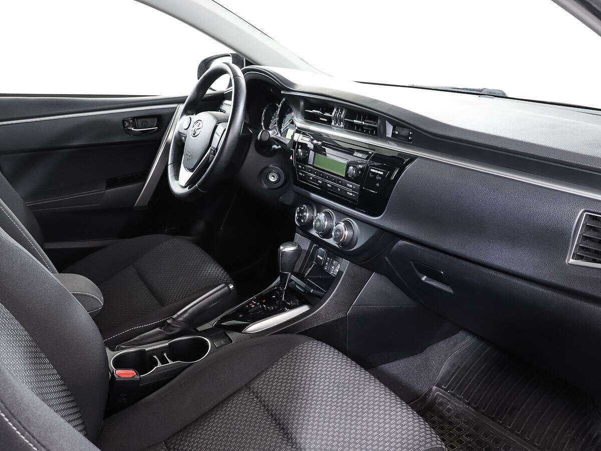 Toyota Corolla 2013 года с пробегом. Фото: #7