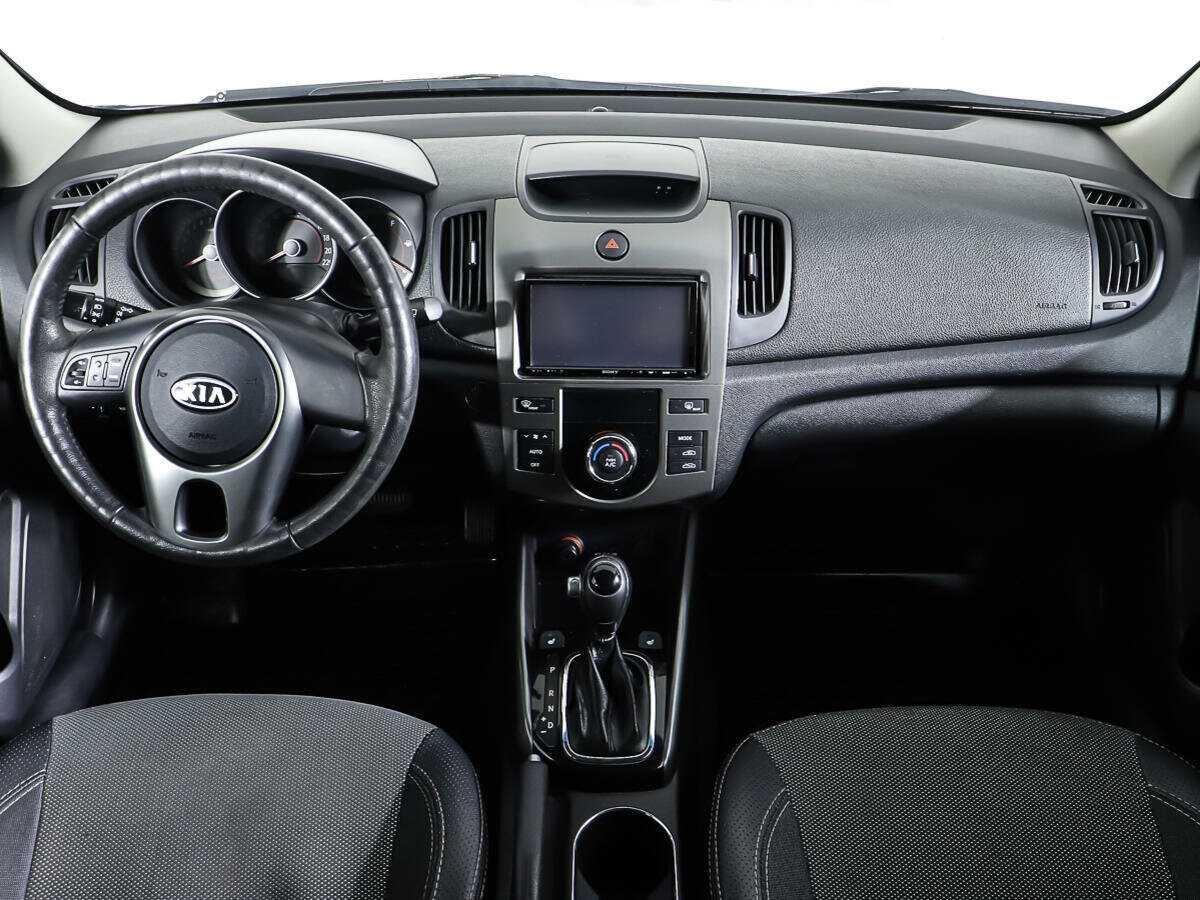 Kia Cerato 2012 года с пробегом. Фото: #12