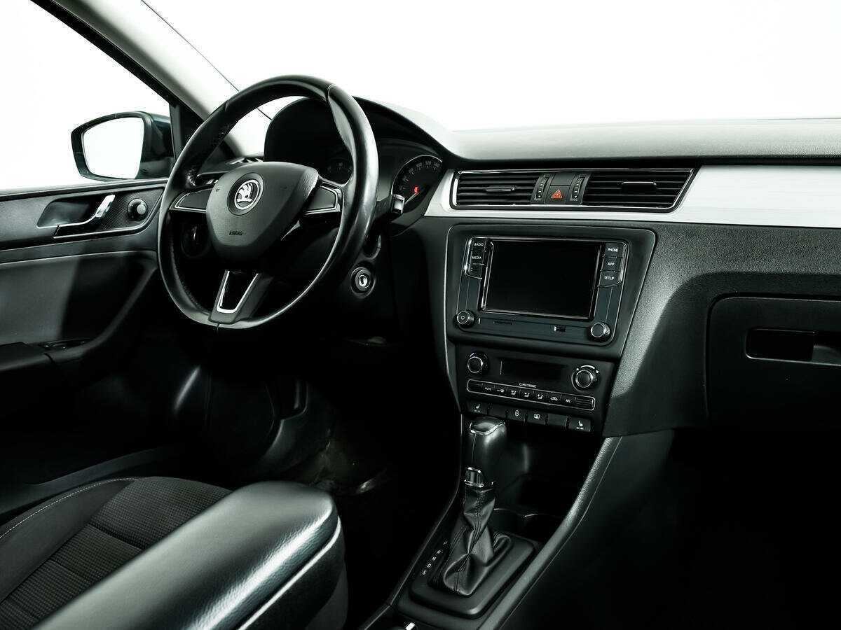 Skoda Rapid 2014 года с пробегом. Фото: #8