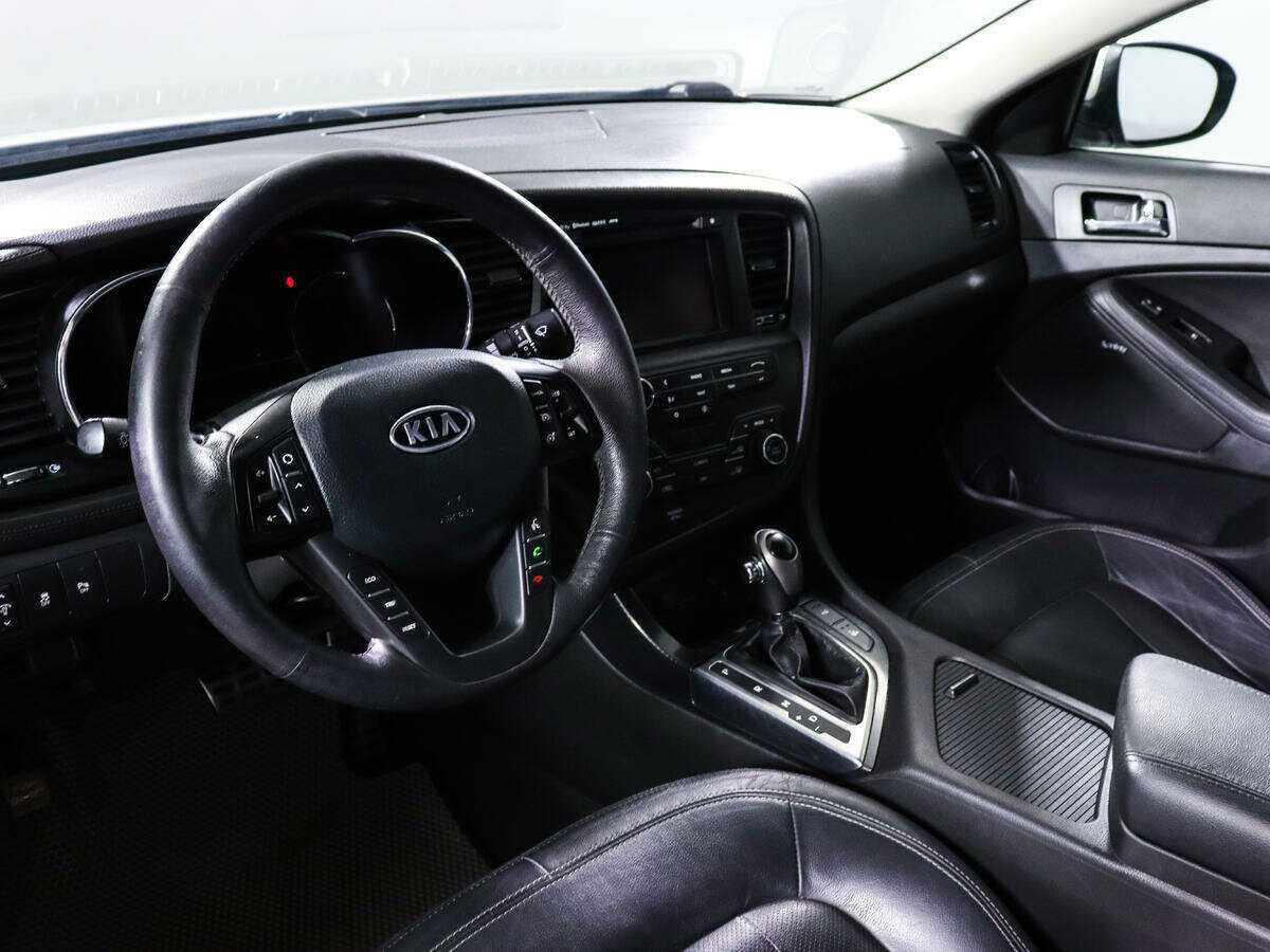 Kia Optima 2012 года с пробегом. Фото: #11