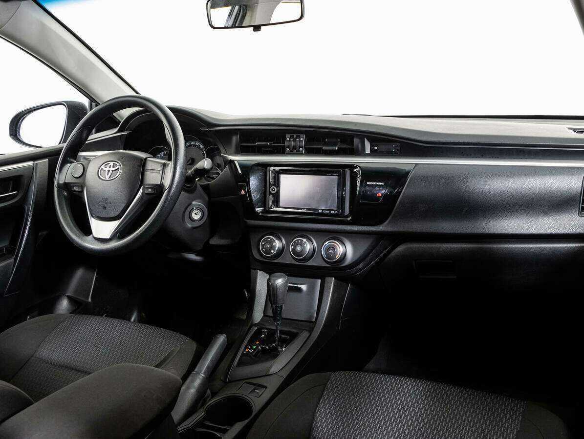 Toyota Corolla 2014 года с пробегом. Фото: #6