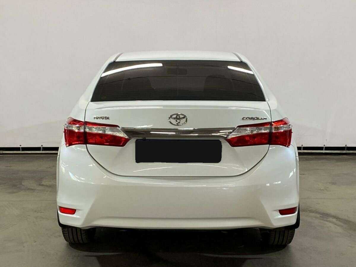 Toyota Corolla 2014 года с пробегом. Фото: #5