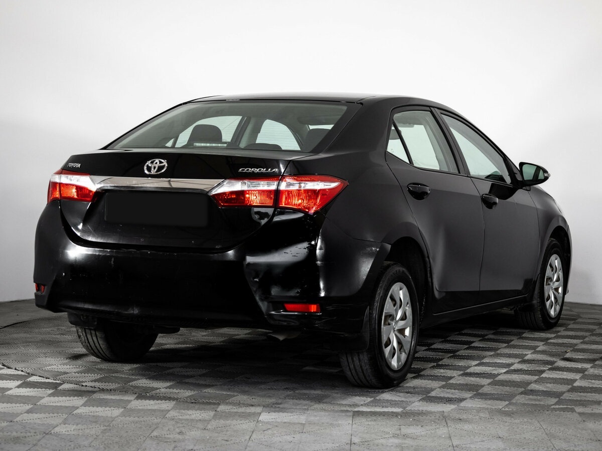 Toyota Corolla 2014 года с пробегом. Фото: #2
