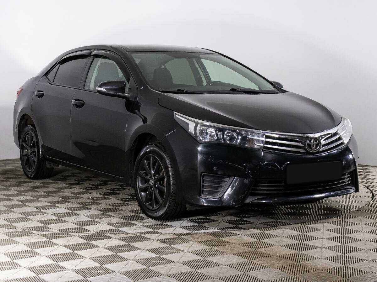 Toyota Corolla 2013 года с пробегом. Фото: #2