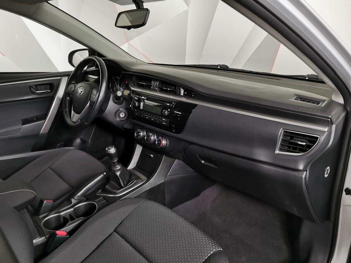 Toyota Corolla 2013 года с пробегом. Фото: #8