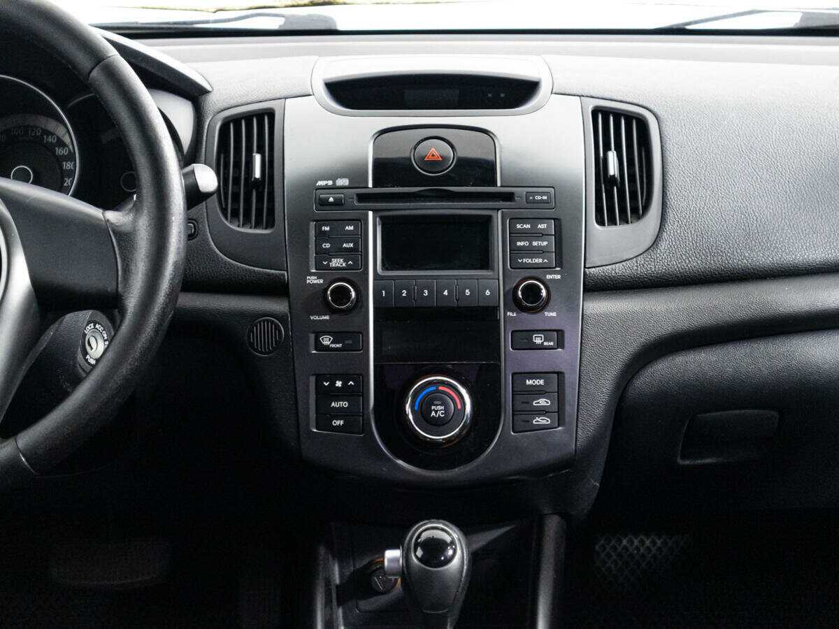 Kia Cerato 2012 года с пробегом. Фото: #13