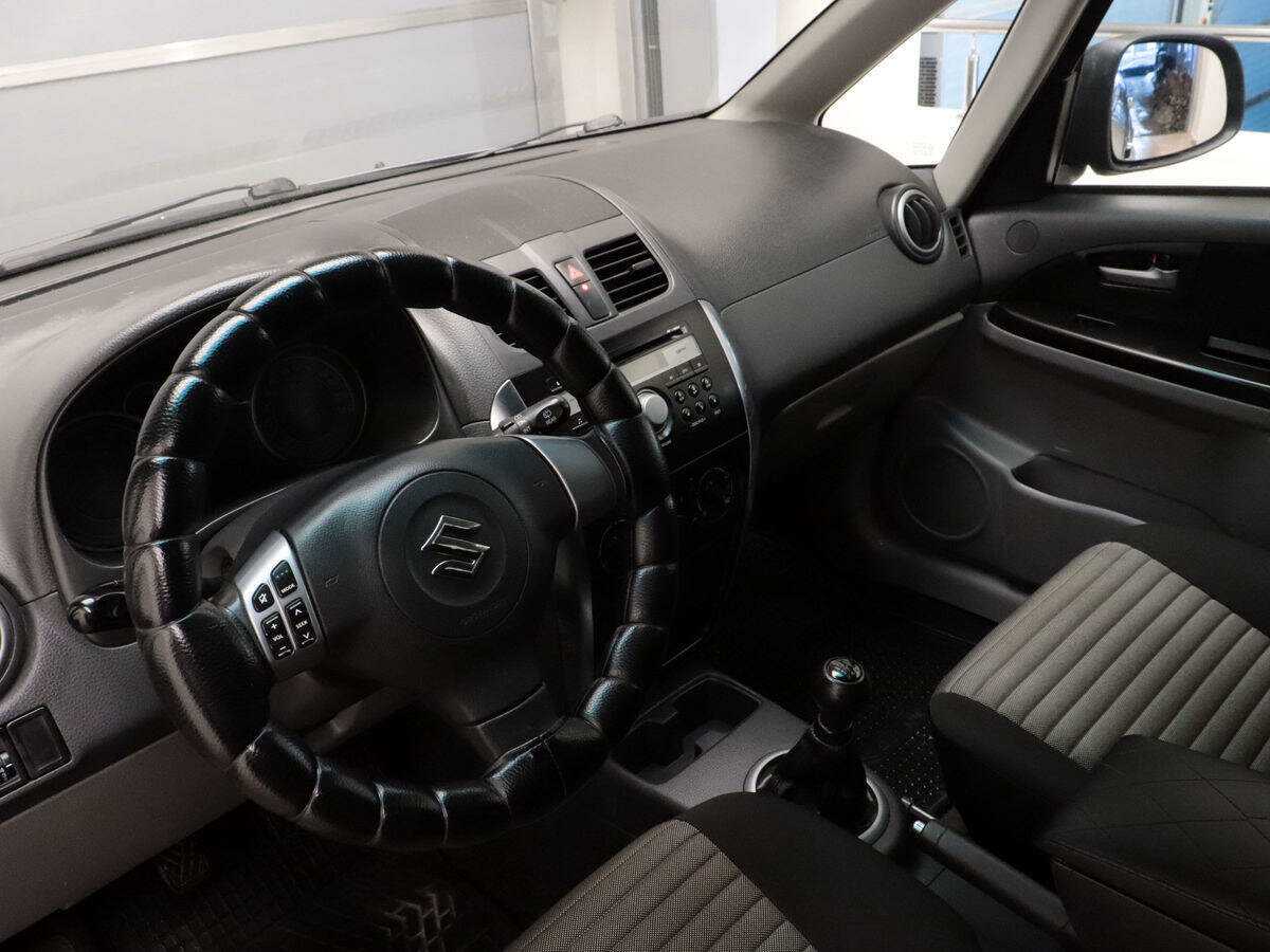 Suzuki SX4 2012 года с пробегом. Фото: #8