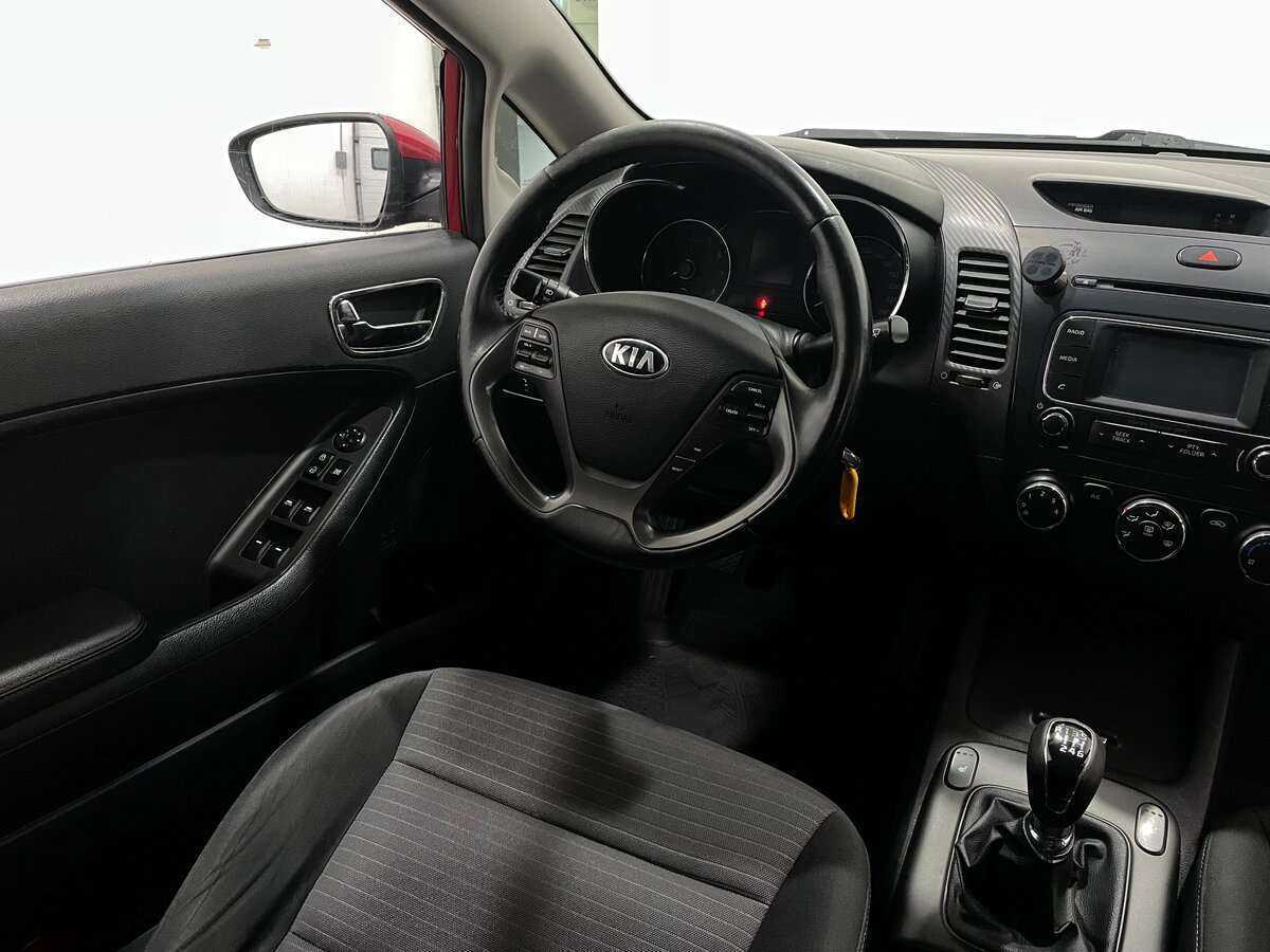 Kia Cerato 2013 года с пробегом. Фото: #4