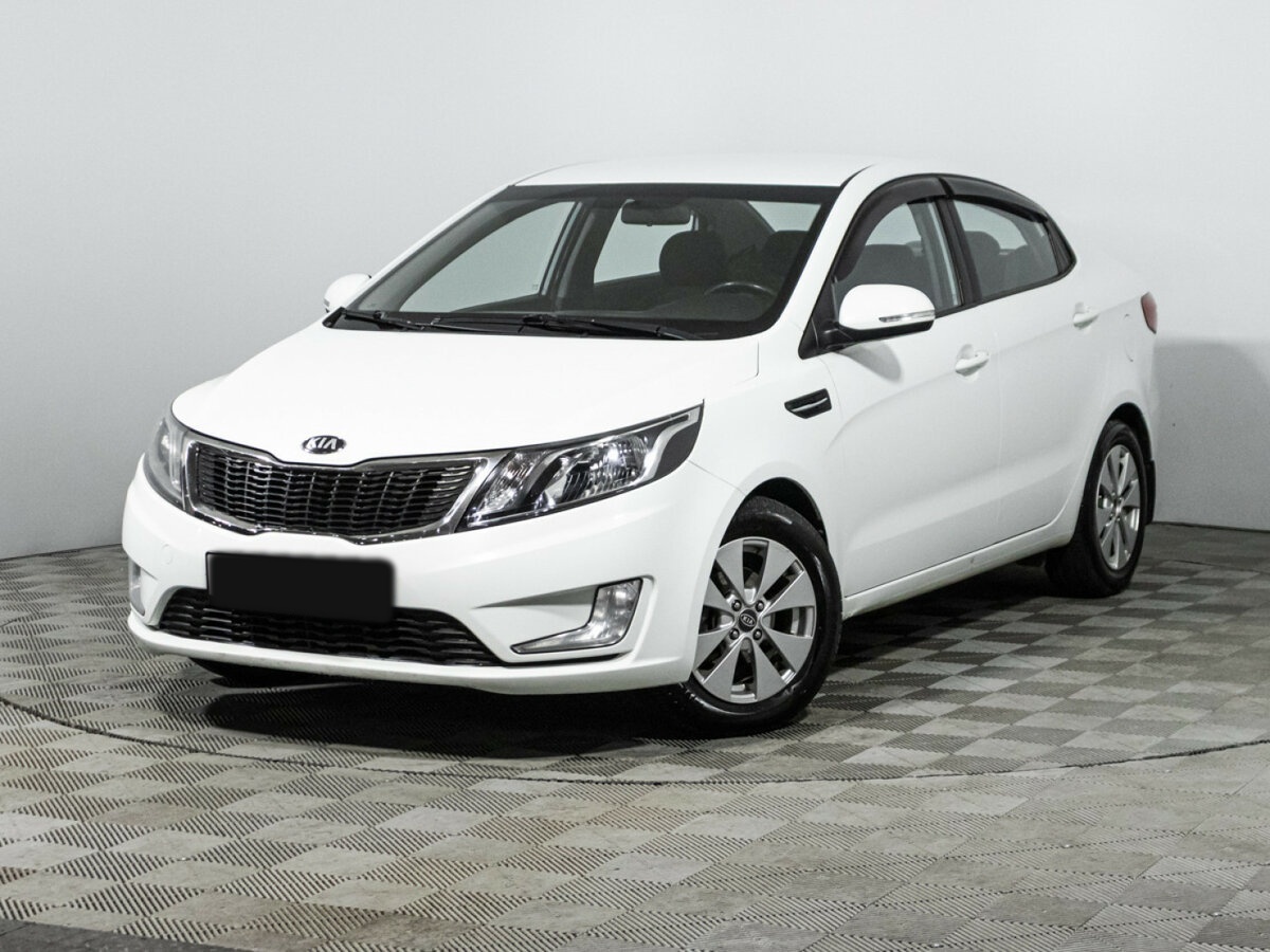 Kia Rio 2013 года с пробегом. Посмотреть фото