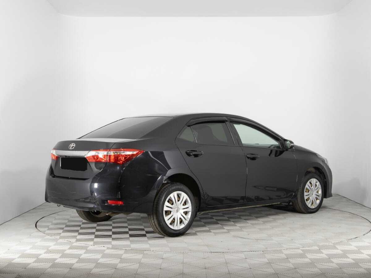 Toyota Corolla 2014 года с пробегом. Фото: #4