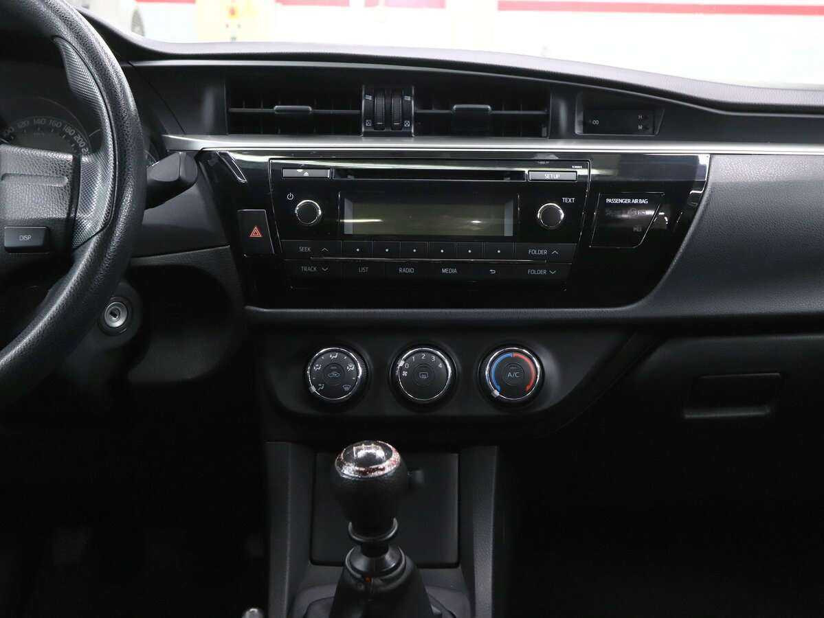 Toyota Corolla 2014 года с пробегом. Фото: #16