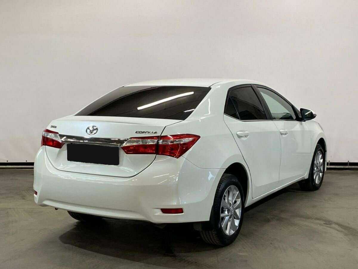 Toyota Corolla 2014 года с пробегом. Фото: #4
