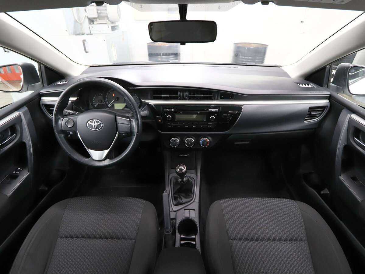 Toyota Corolla 2014 года с пробегом. Фото: #14