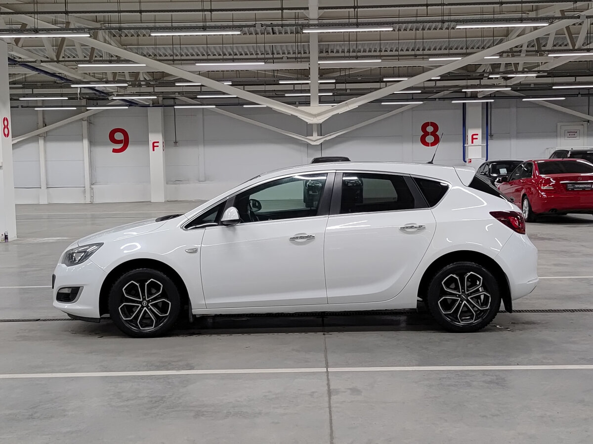 Б/У Опель Астра 2013 года. Фото: #7